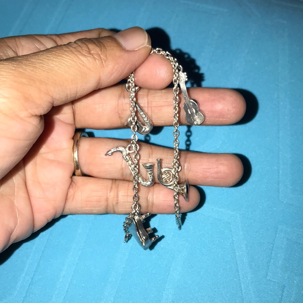 🎀925 stamped sterling silver bracelet w/ 5 charms